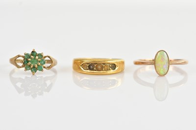 Lot 646 - Two 9ct gold dress rings including an opal...