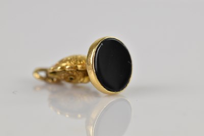 Lot 6 - A yellow metal novelty seal formed as an owl,...