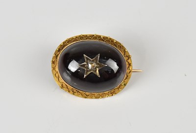 Lot 207 - A Victorian yellow metal and cabochon diamond...