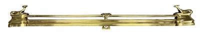 Lot 593 - A late 19th/early 20th century brass fender...