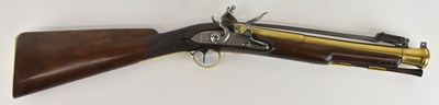 Lot 409 - An 18th century brass barrelled flintlock...