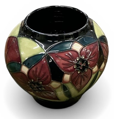 Lot 700 - NICOLA SLANEY FOR MOORCROFT; a squat vase...