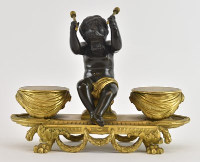 Lot 708 - A late 19th century cast and patinated gilt...
