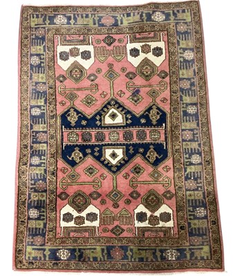 Lot 129 - A modern machine made red ground Caucasian...