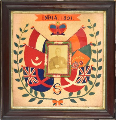 Lot 499 - A 19th century embroidered panel with central...