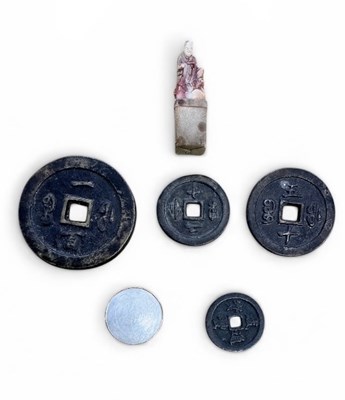 Lot 1079 - A graduated set of four Chinese bronze...