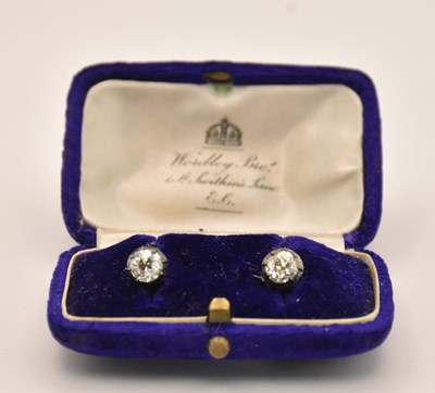 Lot 1483 - A pair of antique white metal diamond set ear...