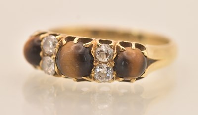 Lot 1250 - A late Victorian 18ct yellow gold tiger's eye...
