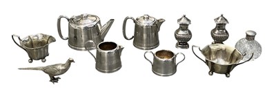 Lot 1082 - An early 20th century silver plated four piece...