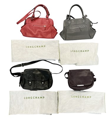 Lot 510 - LONGCHAMP; a collection of four assorted...