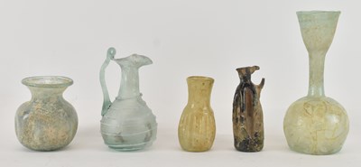 Lot 541 - Five pieces of Ancient Roman glass, including...