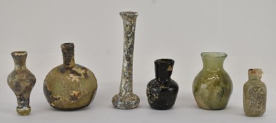Lot 542 - Six pieces of Ancient Roman glass including...