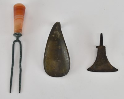 Lot 568 - An ancient Byzantine bronze shoe horn, an...