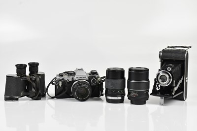 Lot 1323 - OLYMPUS; an OM10 camera, with a Zuiko 50mm...
