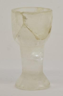 Lot 565 - An ancient Byzantine crystal glass footed cup,...