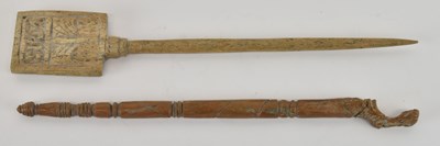 Lot 562 - An ancient carved wooden hairpin, with turned...