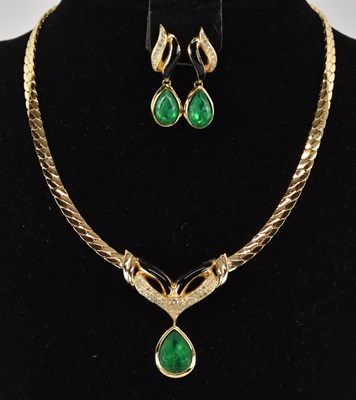 Lot 1562 - CHRISTIAN DIOR; a boxed original vintage gold...