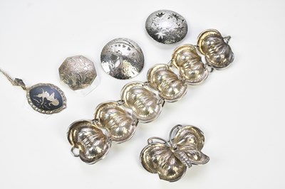 Lot 488 - A hallmarked silver bracelet, formed as six...