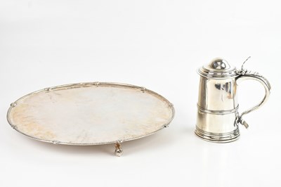 Lot 5 - A large metal salver, with heavily rubbed...