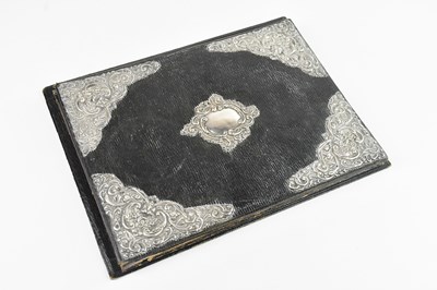 Lot 188 - An Edwardian hallmarked silver mounted leather...