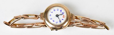 Lot 920 - A 9ct yellow gold cocktail watch, the white...