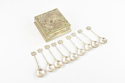Lot 277 - Nine Indian white metal spoons with palm tree...