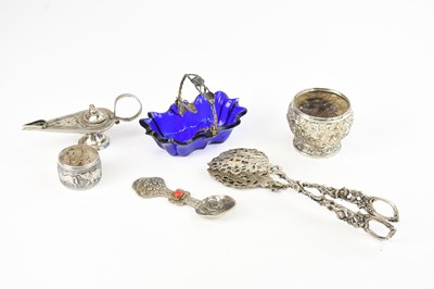 Lot 10 - An Indian white metal bowl decorated with...