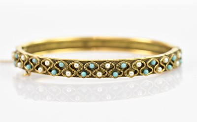 Lot 113 - A late Victorian gold-plated hinged snap...