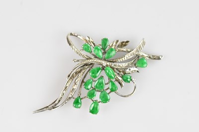 Lot 171 - A Chinese white metal floral brooch set with...