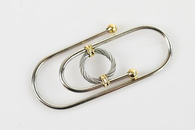Lot 42 - A silvered and gilt metal paper clip, length...