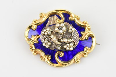 Lot 201 - A Victorian yellow metal and royal blue enamel...