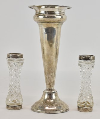 Lot 1256 - A George V hallmarked silver trumpet vase with...