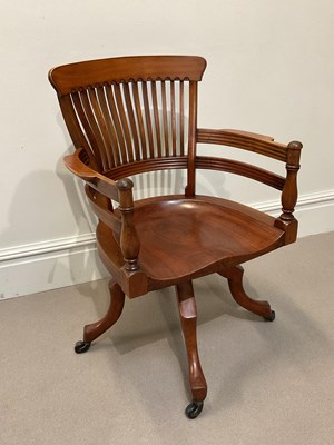 Lot 8 - AFTER E W GODWIN; a late 19th century walnut...