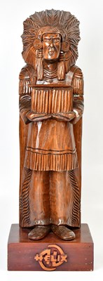 Lot 631 - HELIX; a carved wooden advertising figure of a...