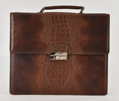Lot 506 - TEXIER; a modern crocodile skin brown leather...