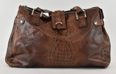 Lot 507 - TEXIER; a lady's brown crocodile skin leather...