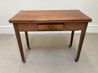 Lot 223 - A 19th century mahogany fold-over tea table...