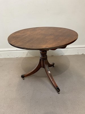 Lot 221 - A Georgian mahogany tilt-top tripod table....