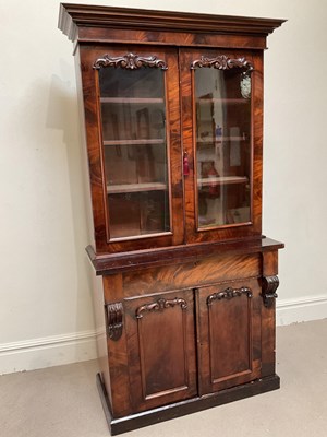 Lot 178 - A Victorian mahogany bookcase, the top section...