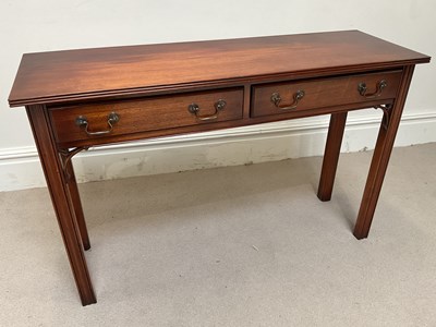 Lot 111 - A reproduction mahogany two drawer side table,...
