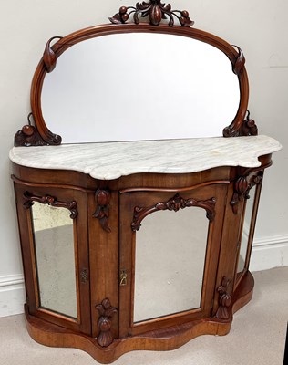 Lot 150 - A Victorian carved walnut duchess type marble...