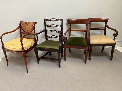 Lot 180 - An Edwardian painted satinwood elbow chair...