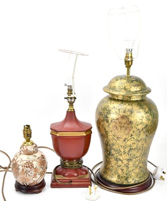 Lot 490 - A group of three modern table lamps converted...
