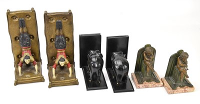 Lot 403 - A pair of bronzed spelter bookends, depicting...