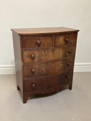 Lot 1112 - An early 19th century mahogany bowfront two...