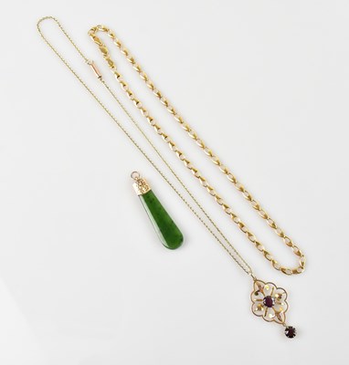 Lot 474 - An Edwardian yellow metal and garnet pendant,...