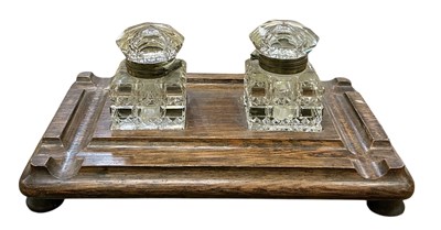 Lot 382 - An early 20th century carved oak cut glass...