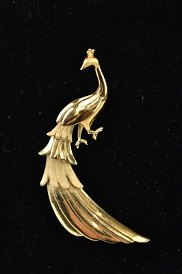 Lot 197 - A yellow metal brooch modelled as a peacock,...