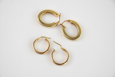 Lot 485 - A pair of 9ct gold horseshoe shaped earrings,...