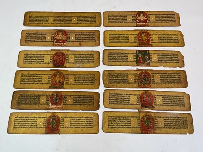 Lot 117 - A Nepalese palm leaf manuscript in twelve...